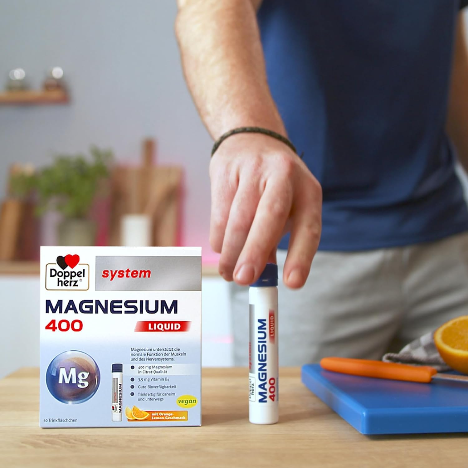doppelherz-system-magnesium-400-liquid-30-trinkfl-schchen-orange-lemon image 2